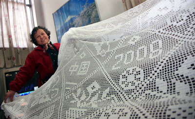 七旬老太鉤出奧運(yùn)大臺布