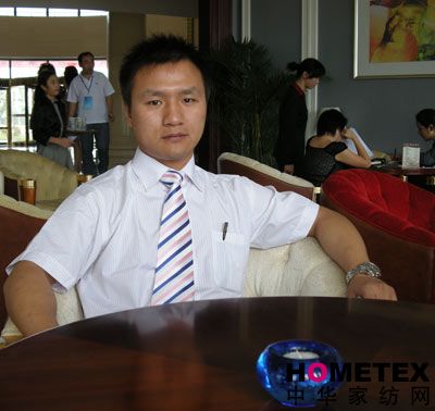 與三套車家紡副總經理郭季兵對話